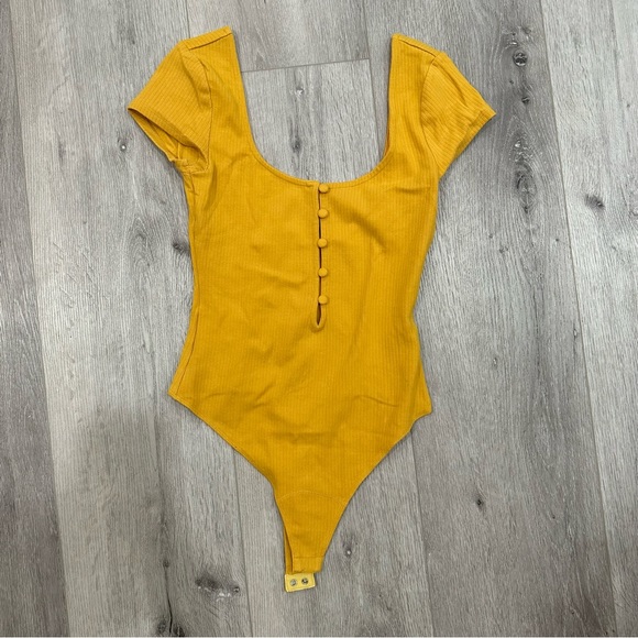 Privacy Please Yellow Ribbed Button Bodysuit - Picture 1 of 3